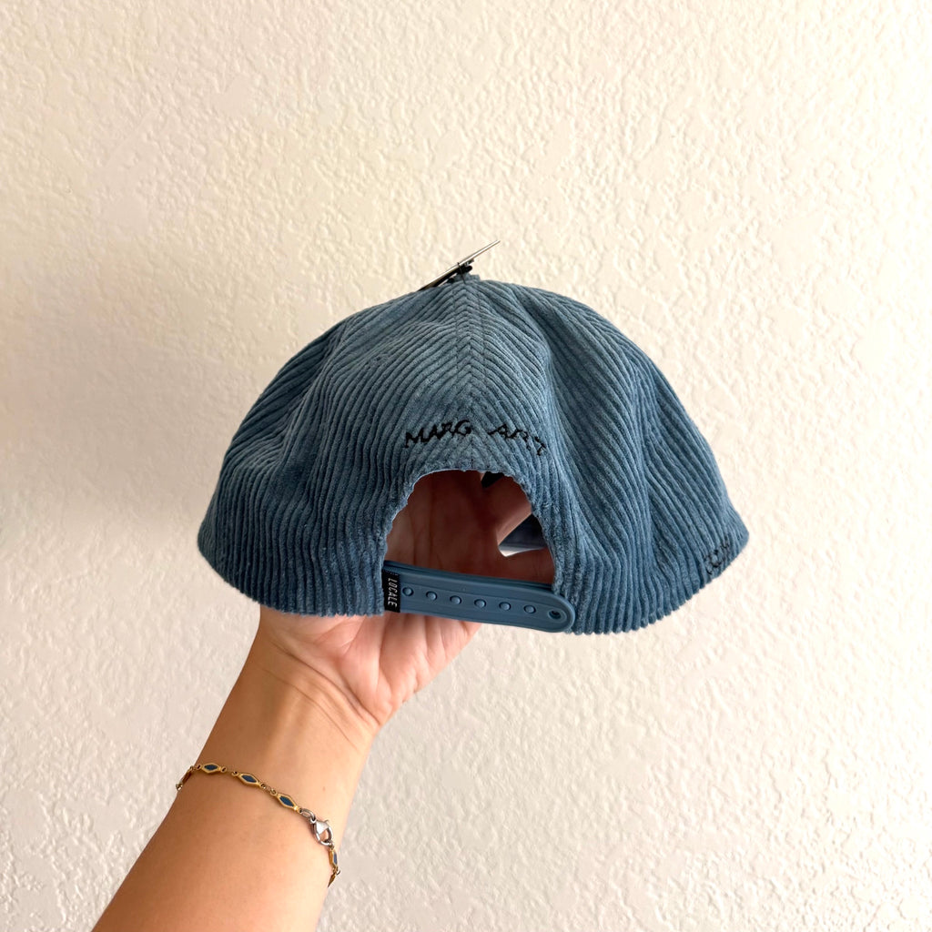 He created first hat (Marg Art x 3:23)