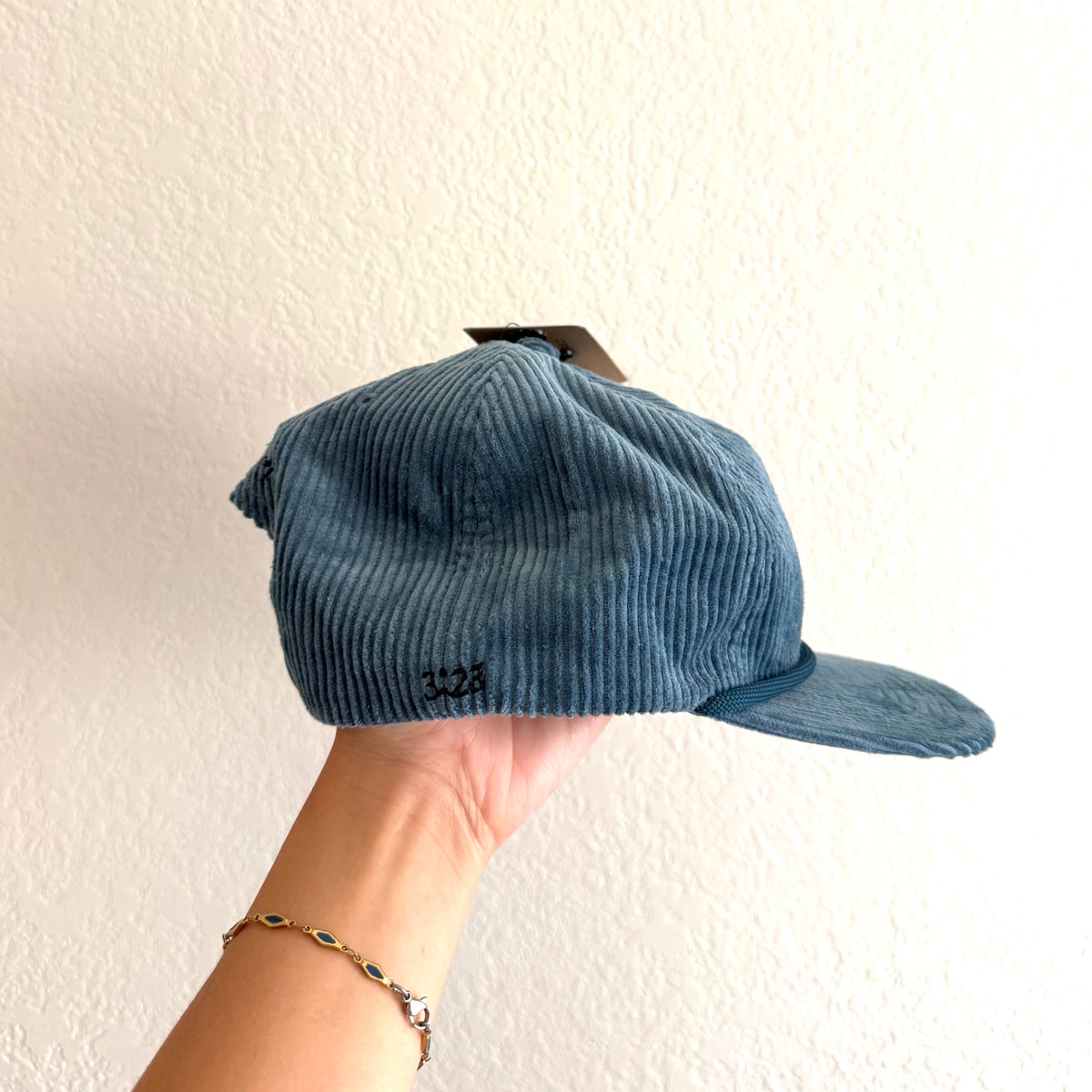 He created first hat (Marg Art x 3:23)